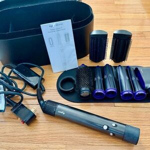 Like NEW Dyson Air wrap hair styling set with 9 attachments.